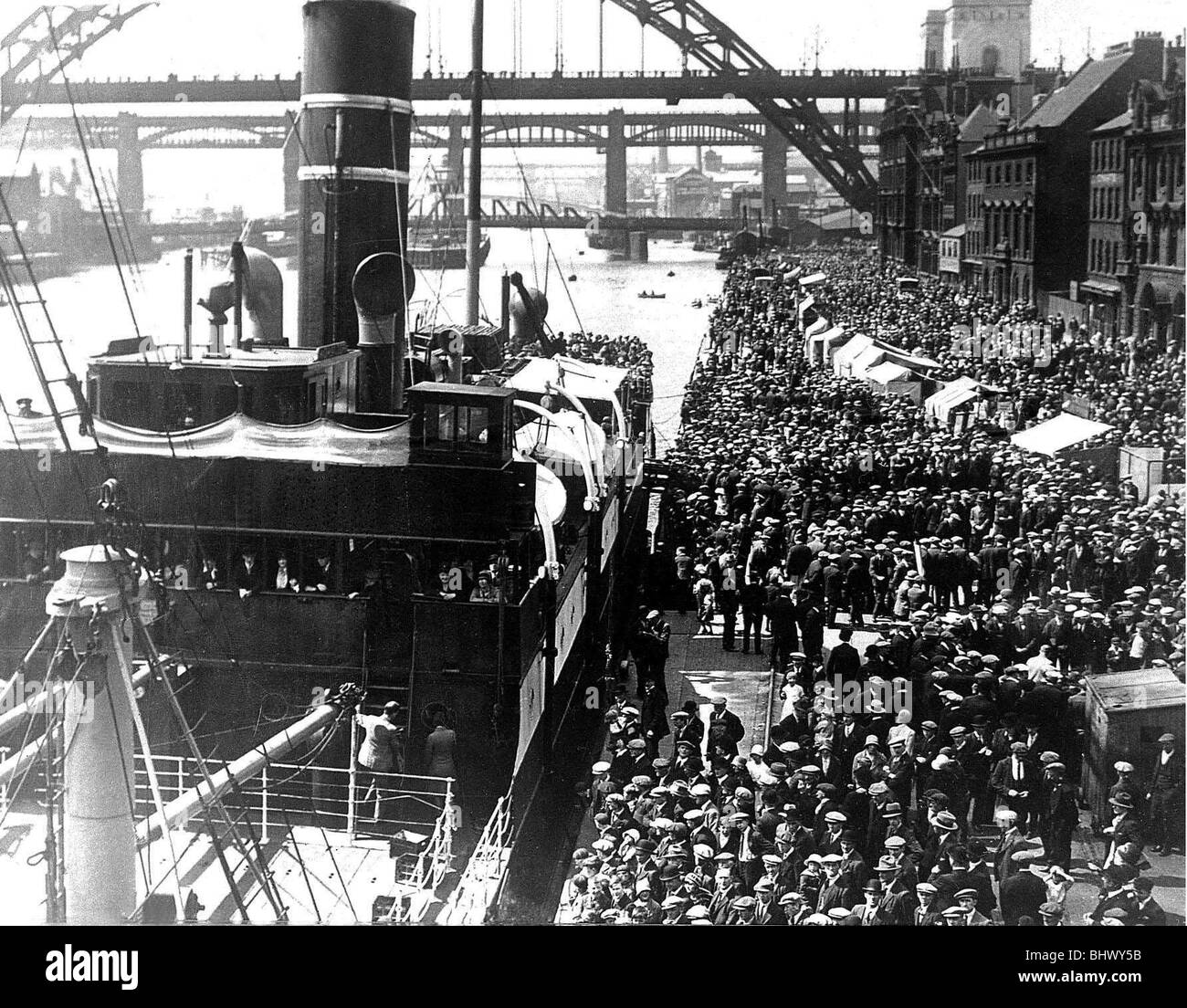 THE BERNICIA CARRYING NEWCASTLE UNITED FANS TO WEMBLY IN 1924. NEWCASTLE UNITED PLAYED ASTON VILLA IN THE FA CUP FINAL. Newcastle Quayside a few days before the 1932 FA Cup final. United’s supporters gather for what is now an unusual way of getting to the capital – by Tyne Tees Shipping Co. steamer down the North Sea! The trip cost 25 shillings (£1.25p) for a first-class return ticket. Stock Photo