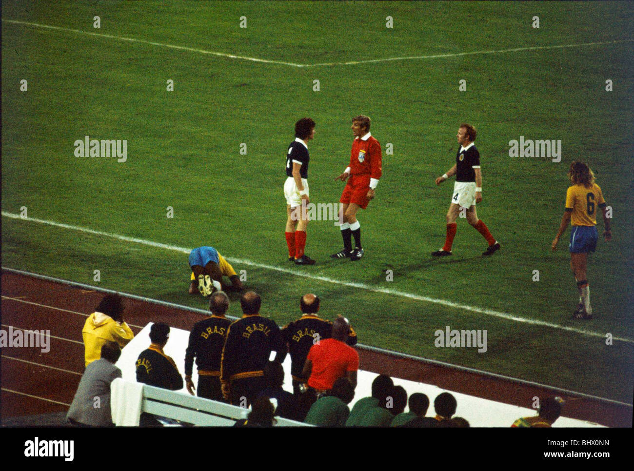 World Cup 1974 Scotland v Brazil Referee Van Gemert has a word with Jardine, Bremner watches ©mirrorpix Stock Photo