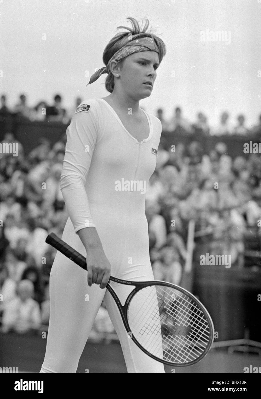 American tennis player Anne White in action wearing her white skin tight  catsuit during her Ladies Singles match against Pam Stock Photo - Alamy