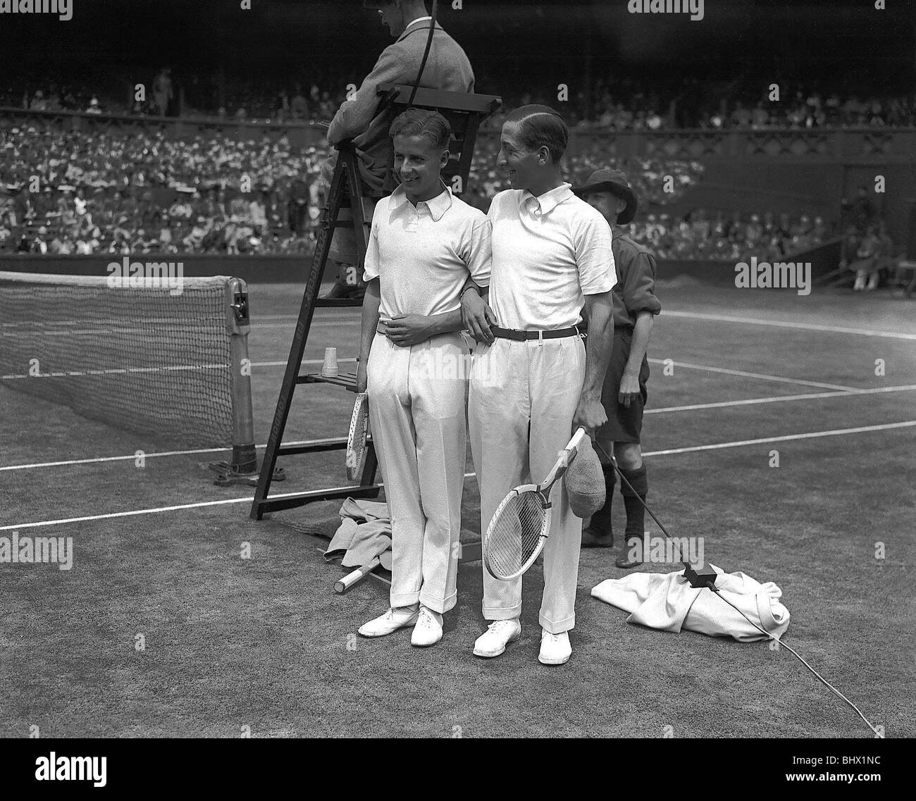 Rene Lacoste and H W Austin pose for the camera before their centre court match at Wimbledon Stock Photo