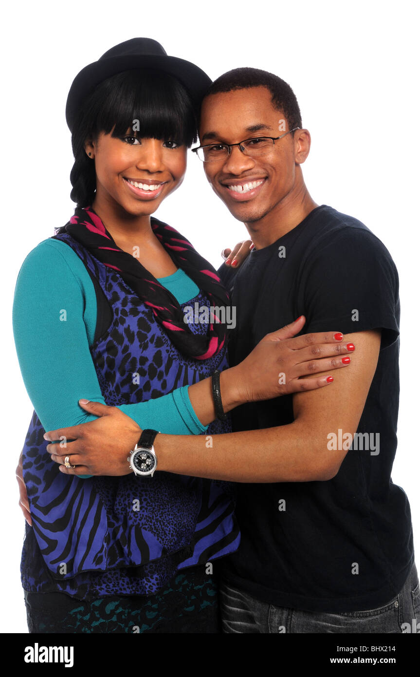 Young couple smiling isolated over white background Stock Photo - Alamy