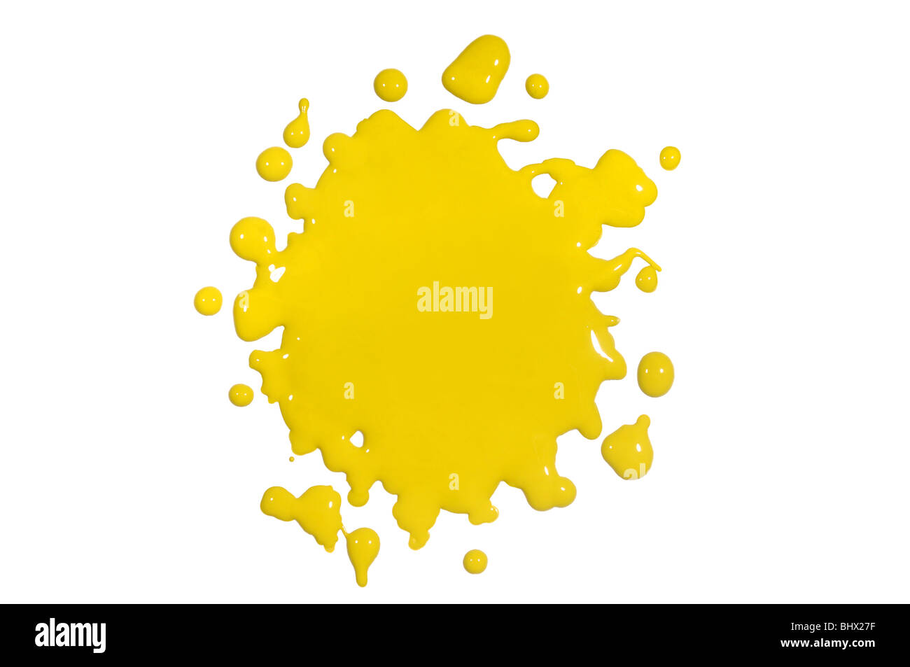 Yellow paint splatter isolated over white background Stock Photo