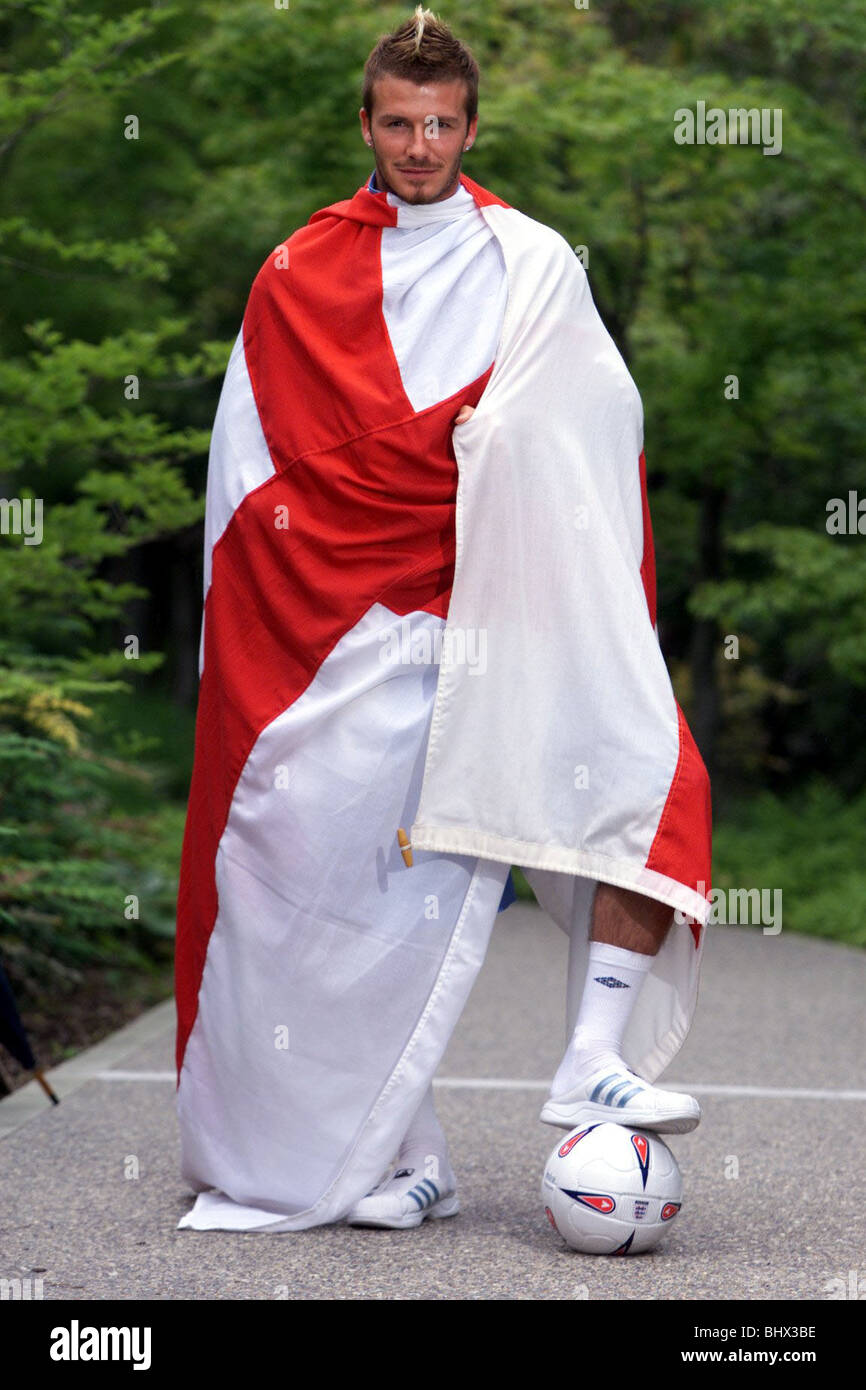 David Beckham, May 2002 The England football captain is photographed draped with the cross of St George on Awaji Island, Japan Stock Photo