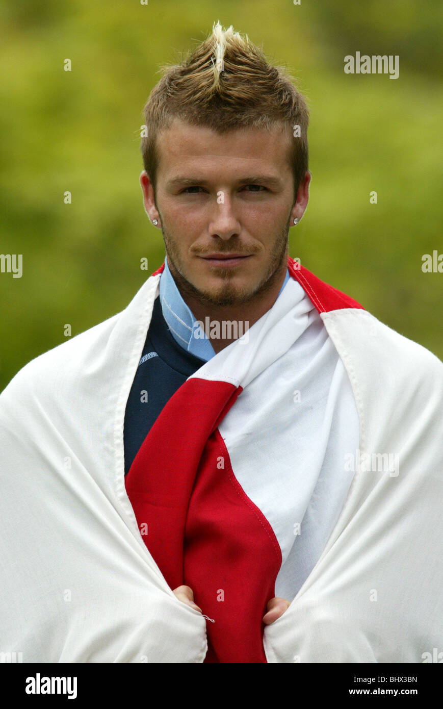 David Beckham, May 2002 The England football captain is photographed draped with the cross of St George on Awaji Island, Japan Stock Photo