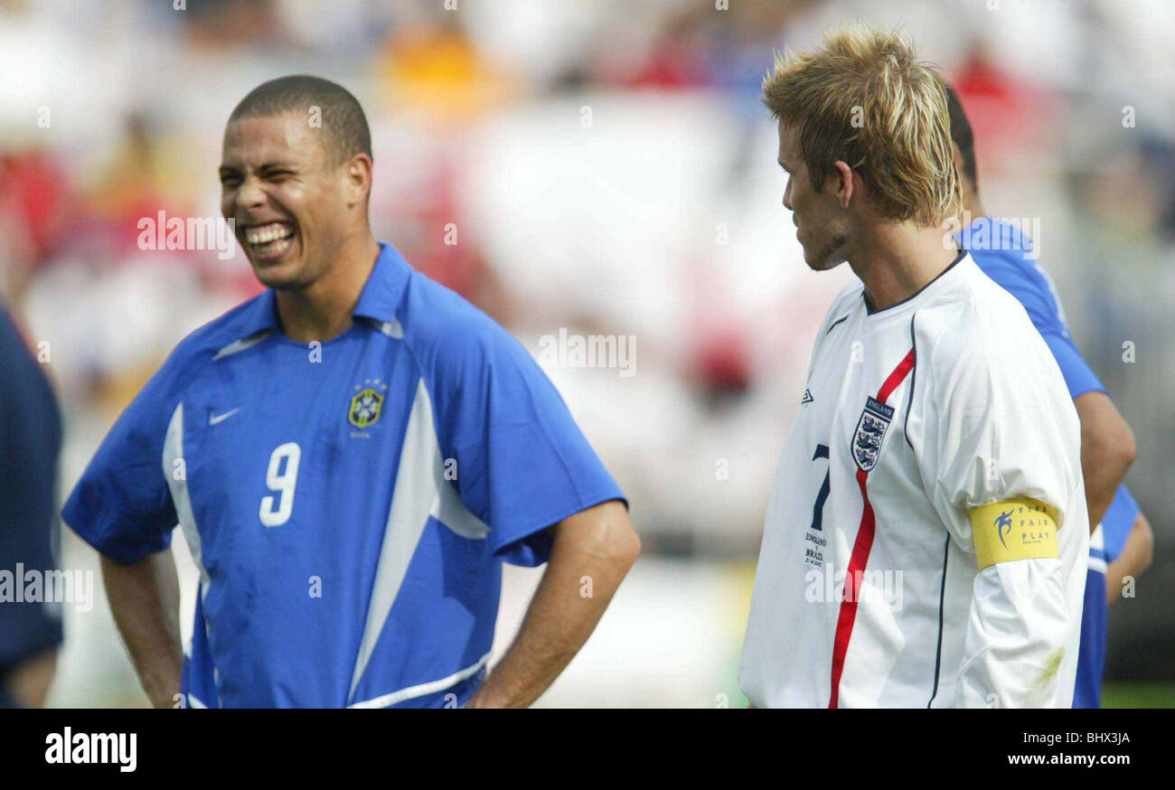 Football June 2002 FIFA World Cup Korea/Japan England v Brazil- Shizouka Stadium David Beckham looks at Ronaldo laughing Stock Photo