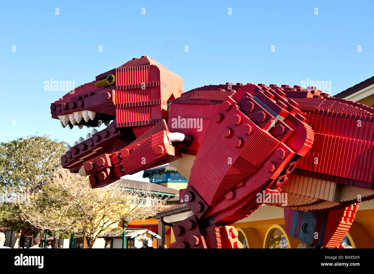 Red Lego dinosaur sculpture outdoors Downtown Disney  Marketplace Orlando Florida FL Stock Photo