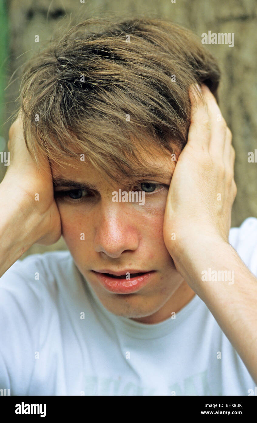 portrait of a sad young man Stock Photo - Alamy