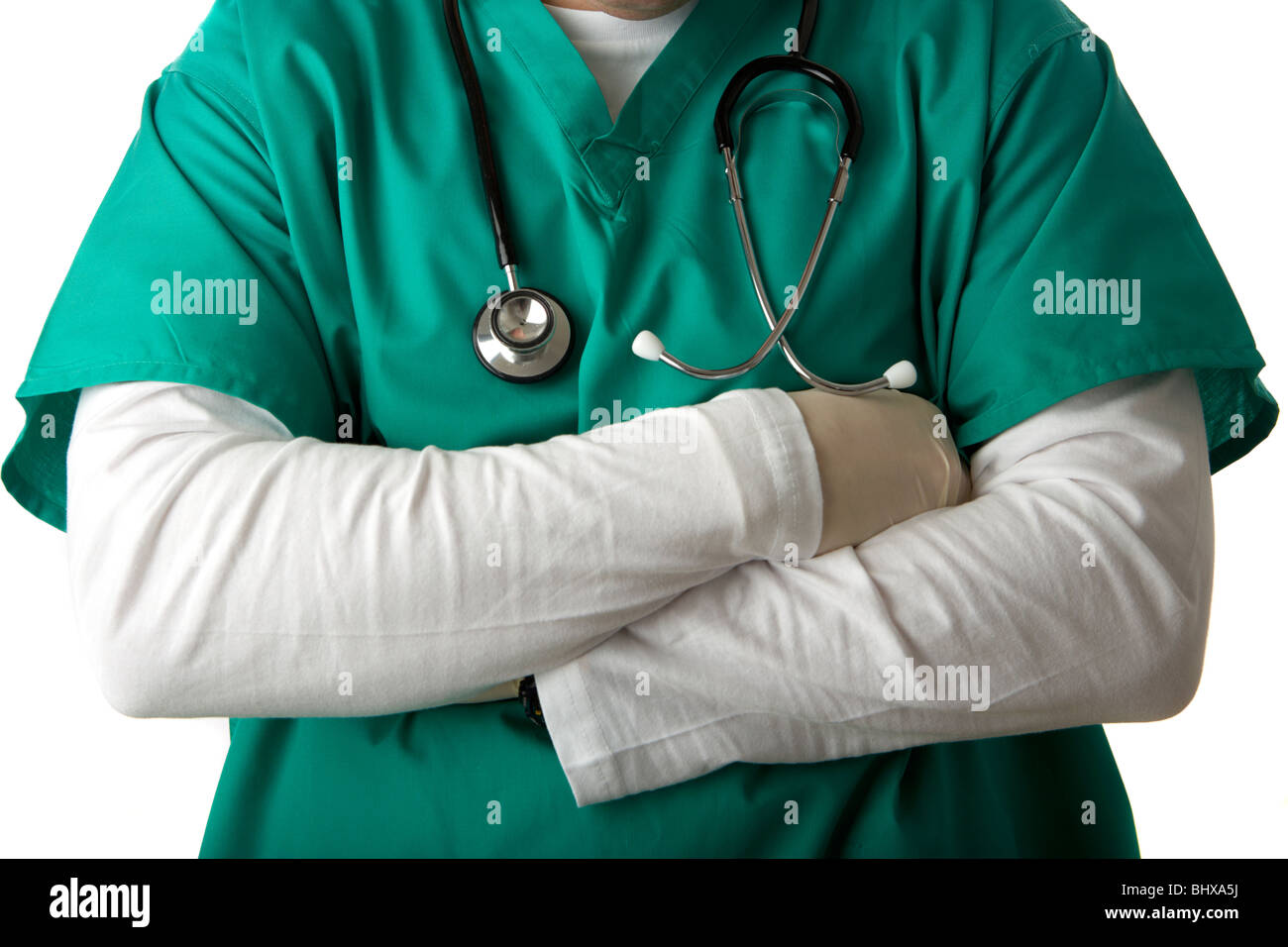 man wearing medical scrubs and stethoscope with arms folded Stock Photo