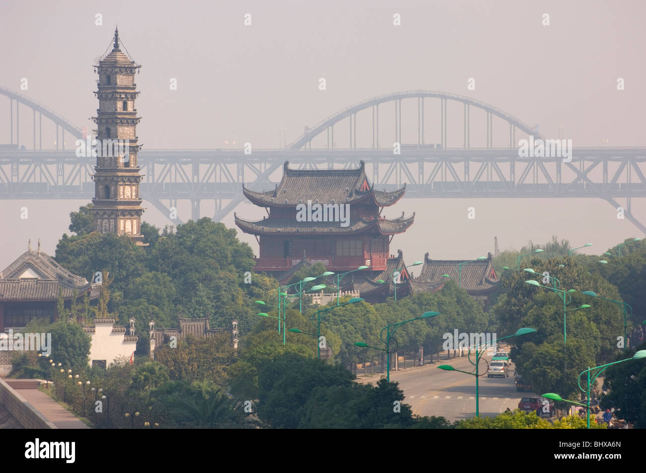 Air pollution in Jiujiang. Jiangxi procince, China. Suojiang Tower and Yangtze River Bridge in the distance. Stock Photo