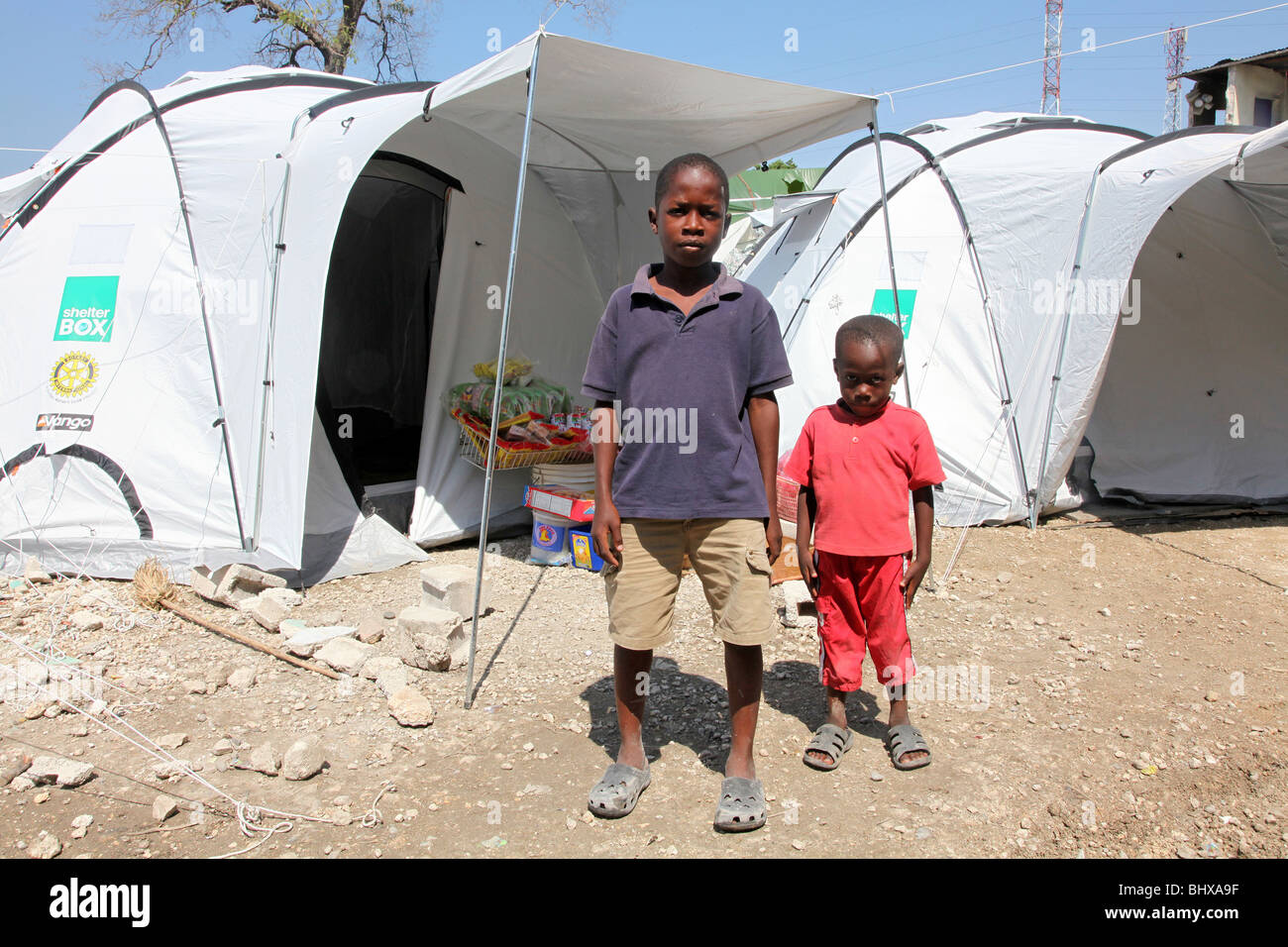 2 young boys in an IDP camp in Canaan, Citie Militaire, Port au Prince, Haiti following the earthquake of January 2010 Stock Photo
