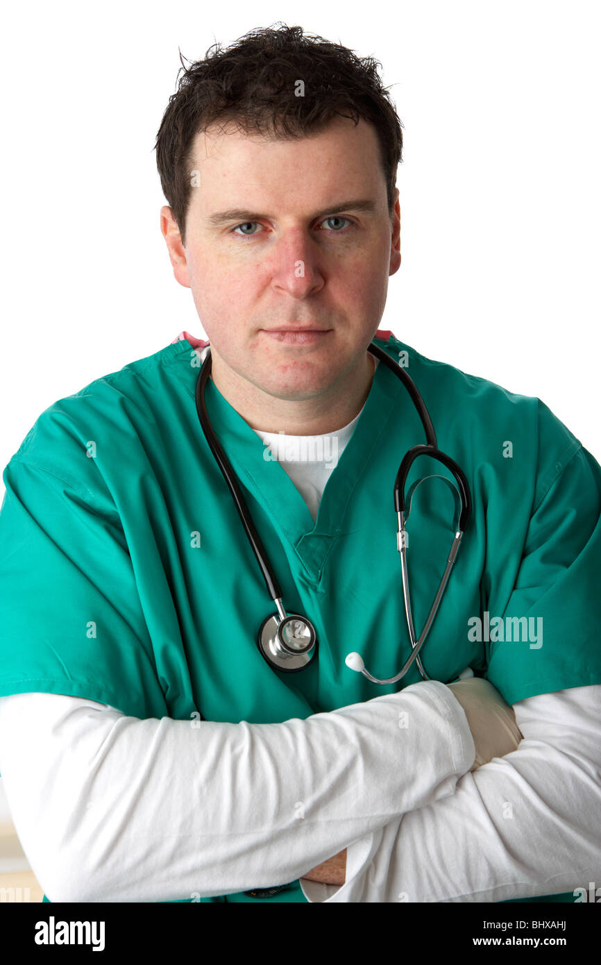 man wearing medical scrubs and stethoscope with arms folded and neutral expression Stock Photo
