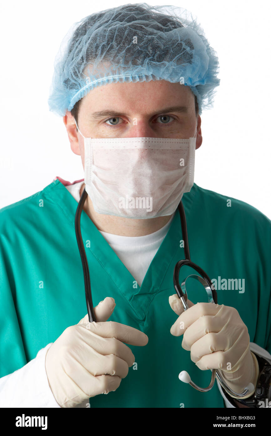 man wearing medical scrubs and stethoscope wearing face mask and hair net basic ppe equipment Stock Photo