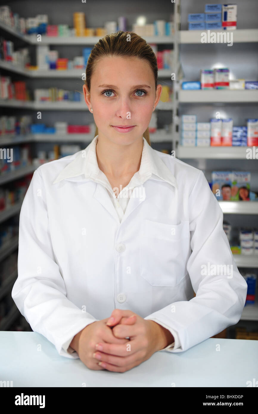 portrait of a blond pharmacist at pharmacy Stock Photo