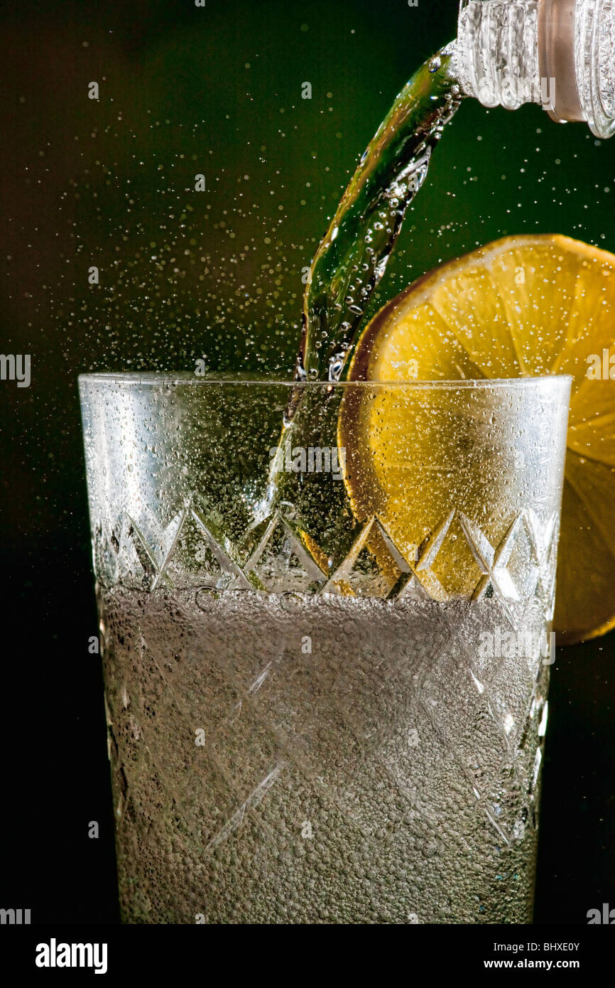 Pouring a gin and tonic Stock Photo Alamy