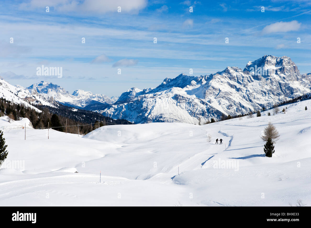 Cross-country skiers on the slopes at the Passo di Falzarego between Andraz and Cortina d'Ampezzo, Dolomites, Italy Stock Photo