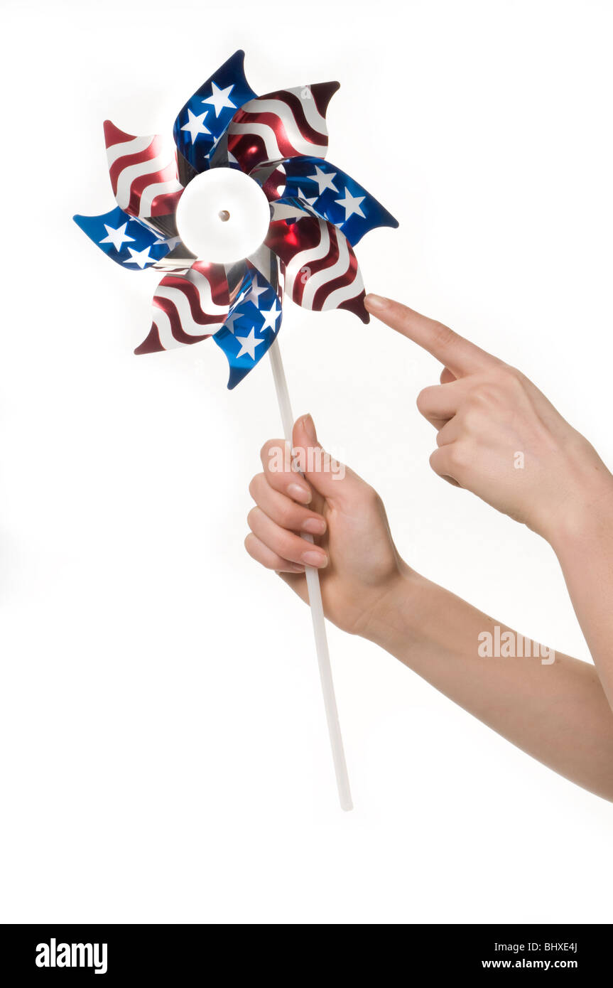 hand and pin wheel Stock Photo Alamy