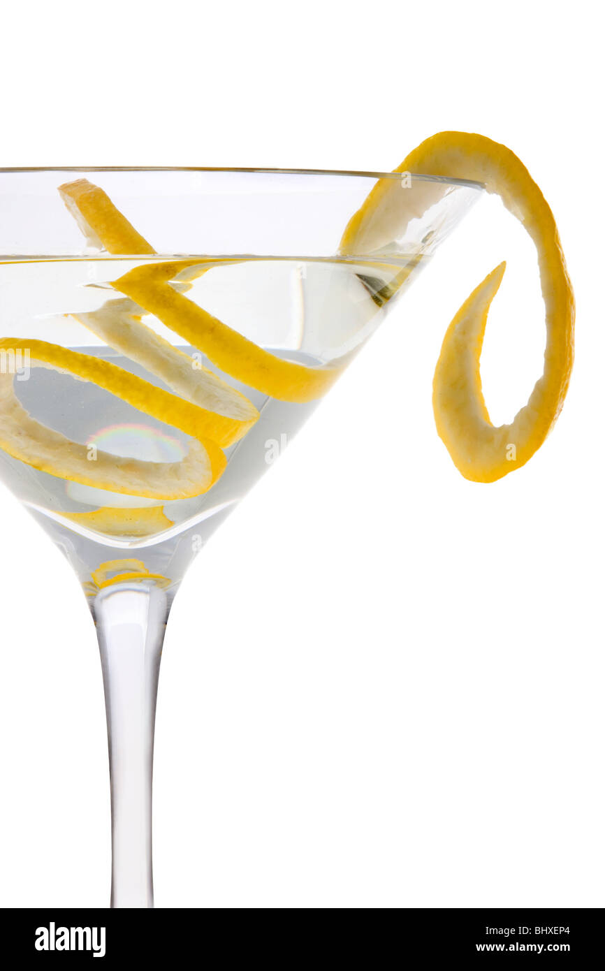 Straight up Martini with lemon peel garnish silhouetted on white