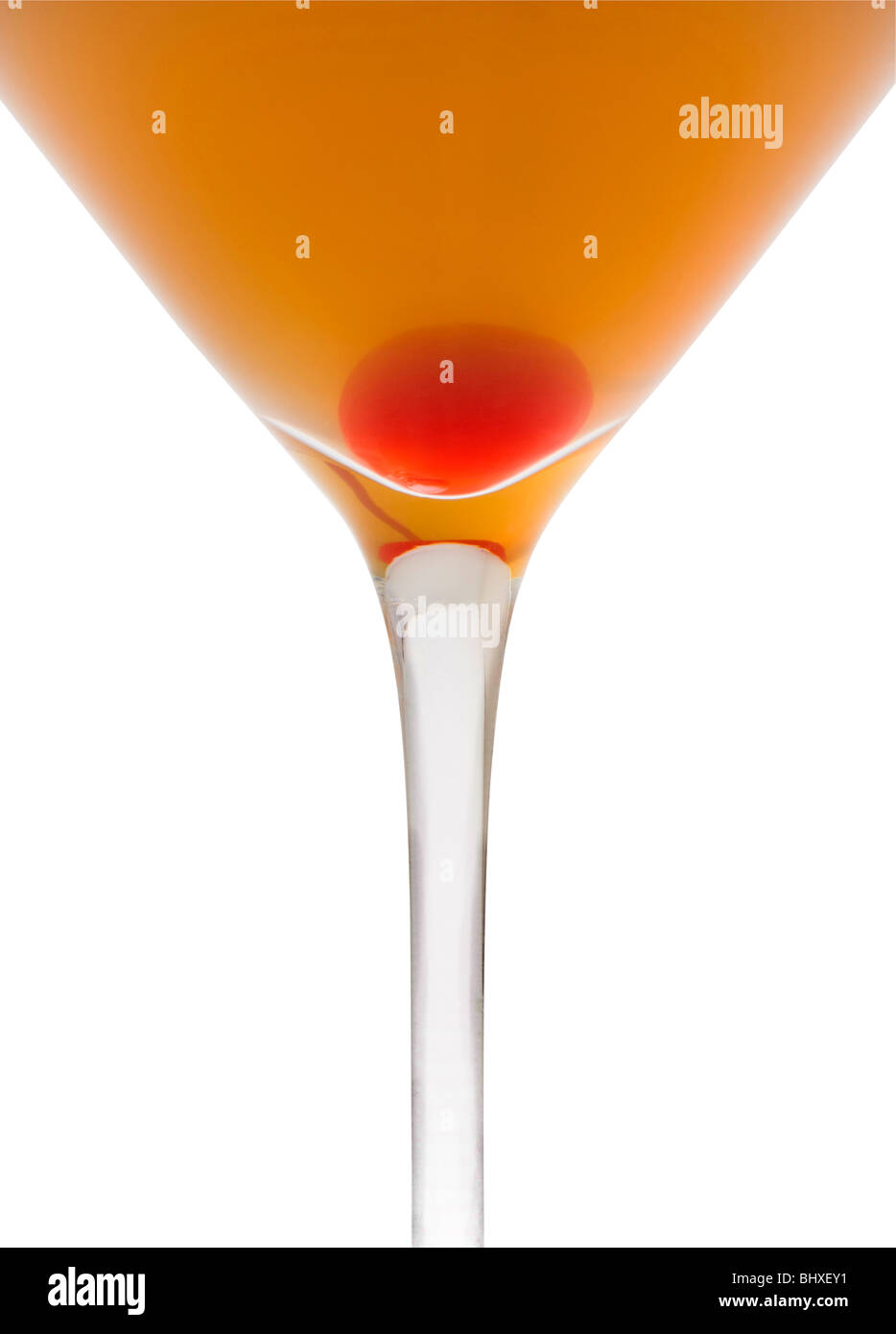 Amaretto Sour mixed drink with cherry on white background Stock Photo