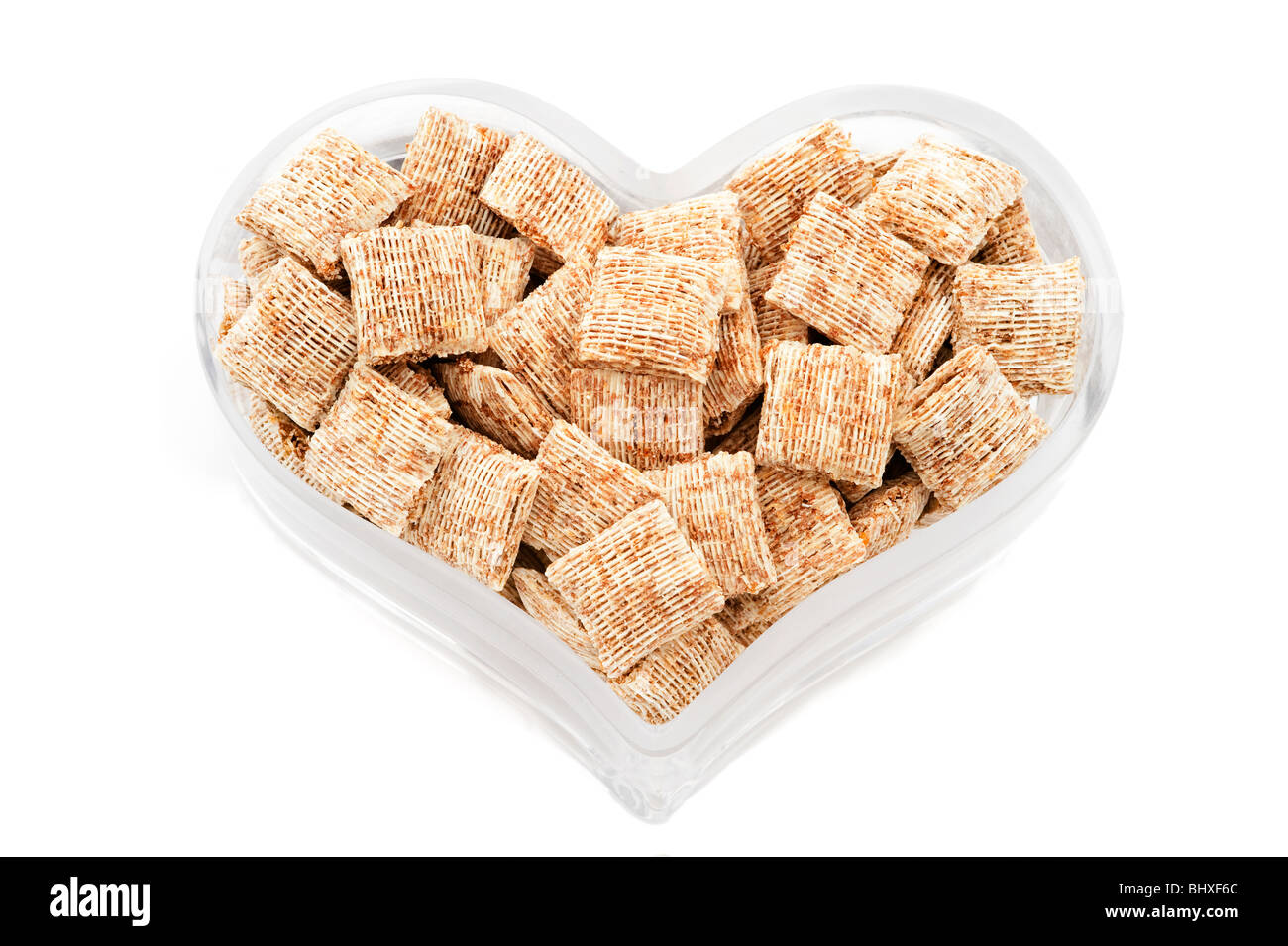 Heart shaped bowl with healthy cereals Stock Photo