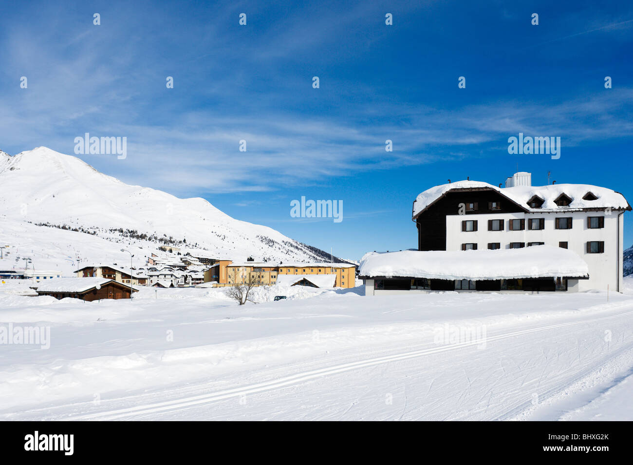 Cross-country ski trails next to the Hotel Savoia near the resort centre, Passo Tonale, Trentino, Italy Stock Photo