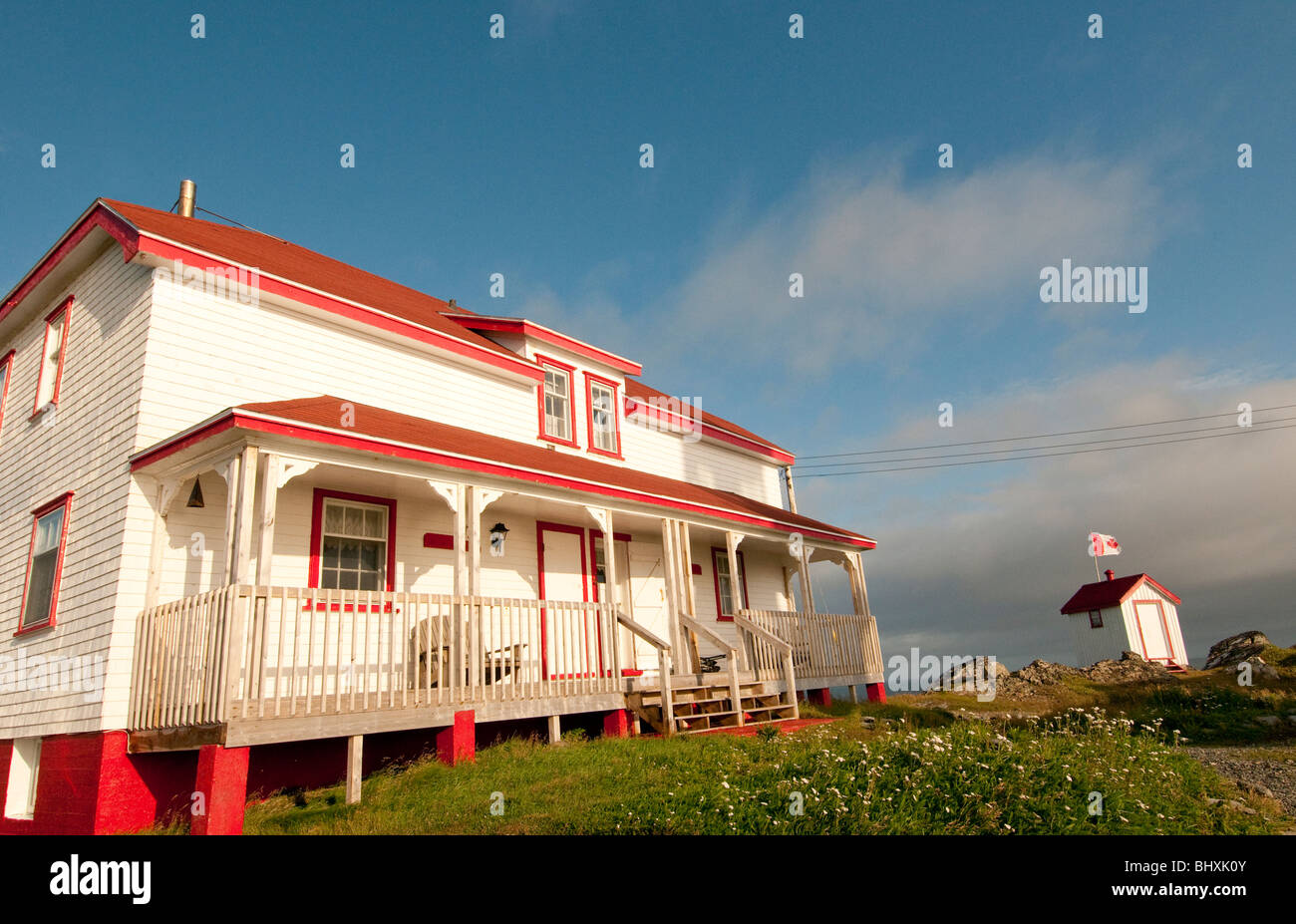 NEWFOUNDLAND, Quirpon Island Lighthouse Inn, Colorful frontal view of
