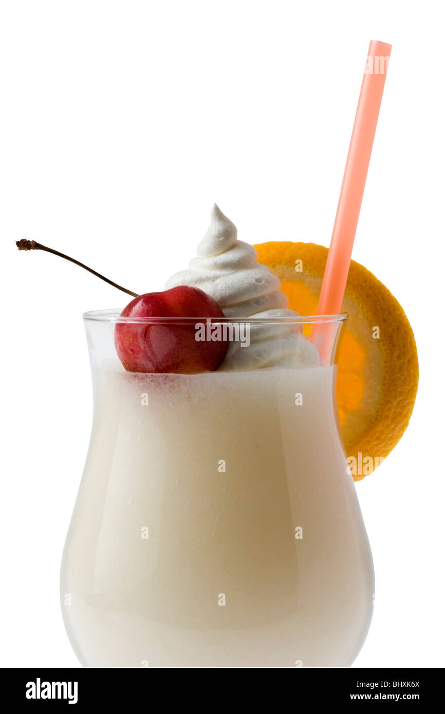 Pina Colada mixed drink with fruit garnish on white background with clipping path Stock Photo