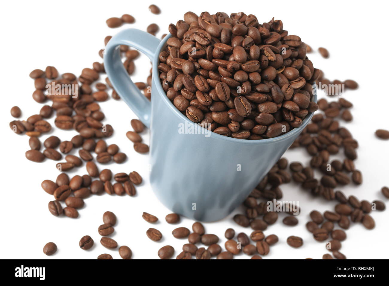 coffee beans and coffee cup on white background Stock Photo - Alamy