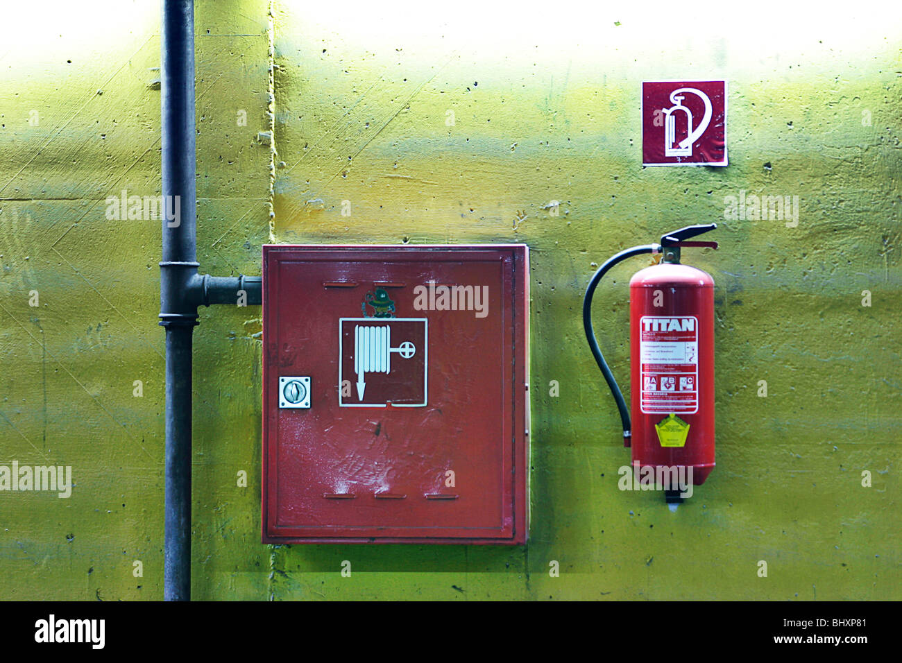 fire extinguisher in a garage Stock Photo Alamy