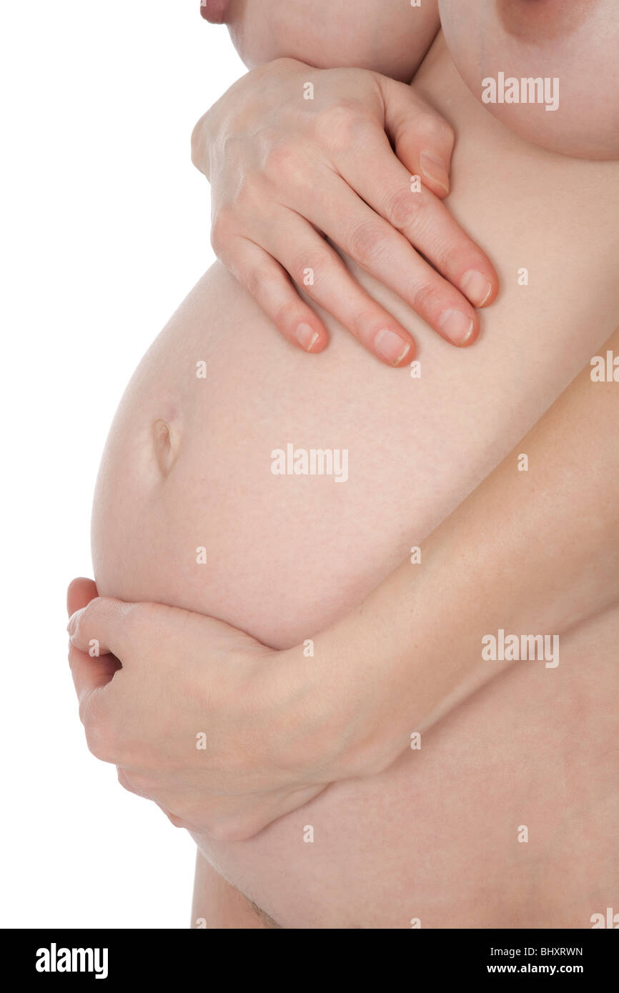 Caucasian woman who is 9 months pregnant on white background Stock Photo