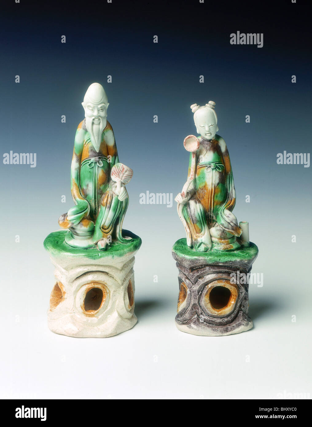 Two incence stick holders in the form of immortals, late Ming dynasty, China, 1600-1644. Artist: Unknown Stock Photo