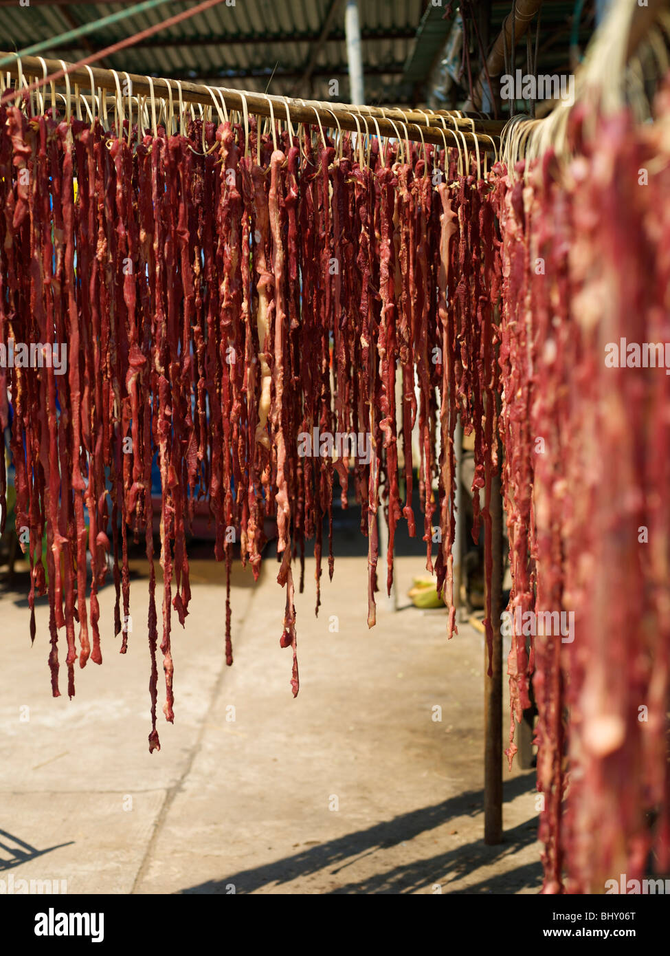 Beef tendons drying in the sun in a market in Thailand Stock Photo Alamy