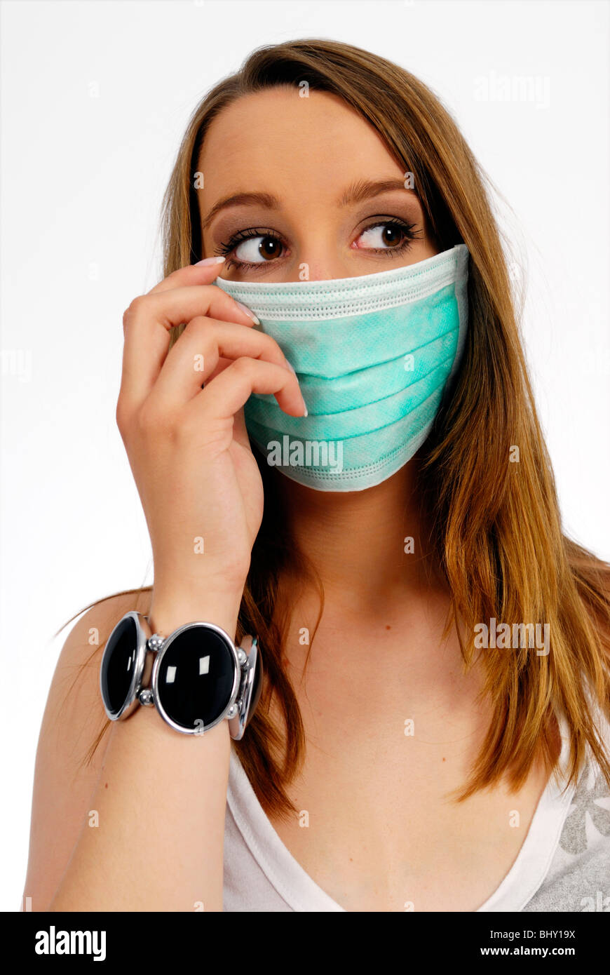 Woman with mouth guards, swine flu Stock Photo