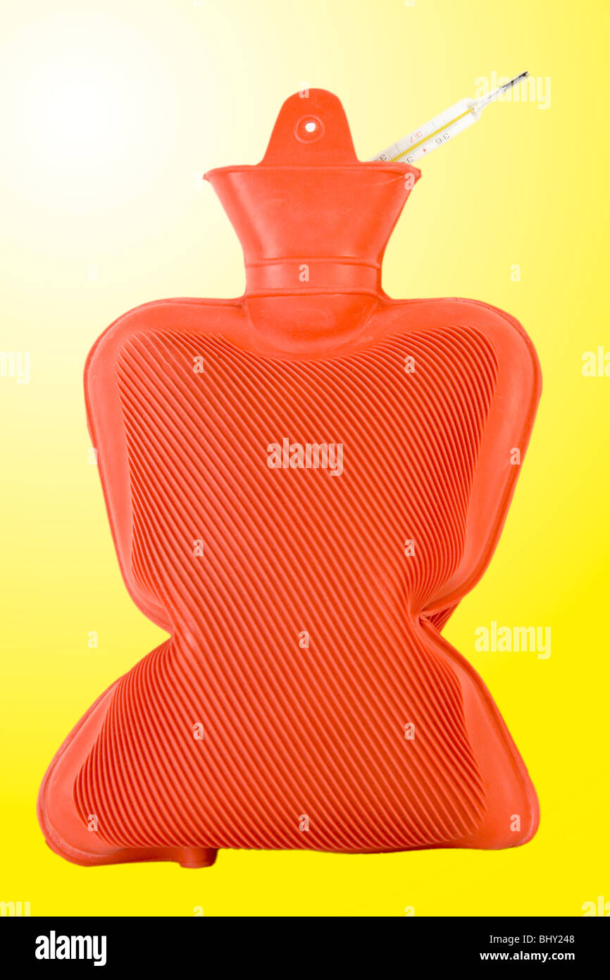 hot water bottle with clinical thermometer Stock Photo Alamy