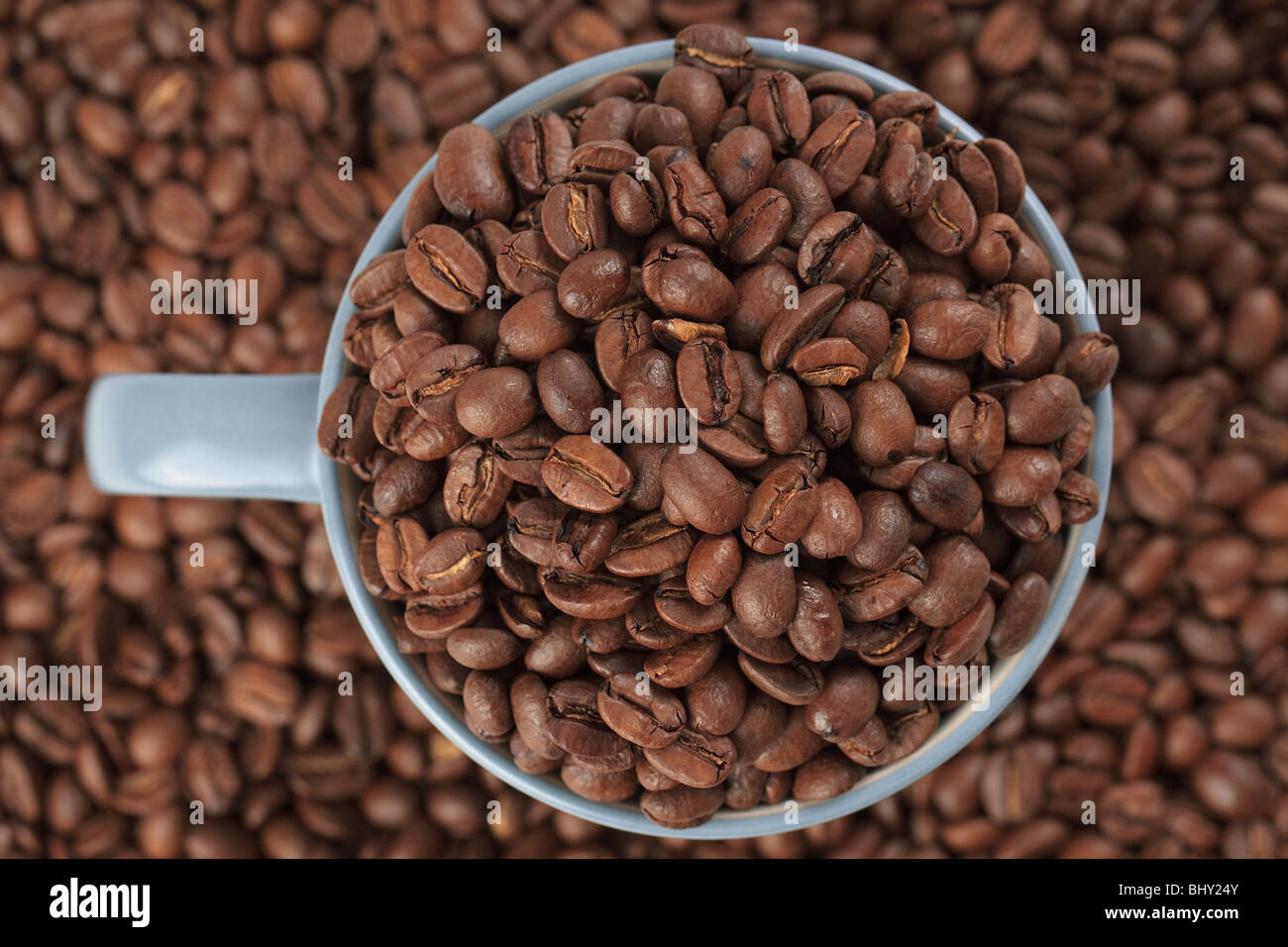 coffee beans and coffee cup on white background Stock Photo - Alamy