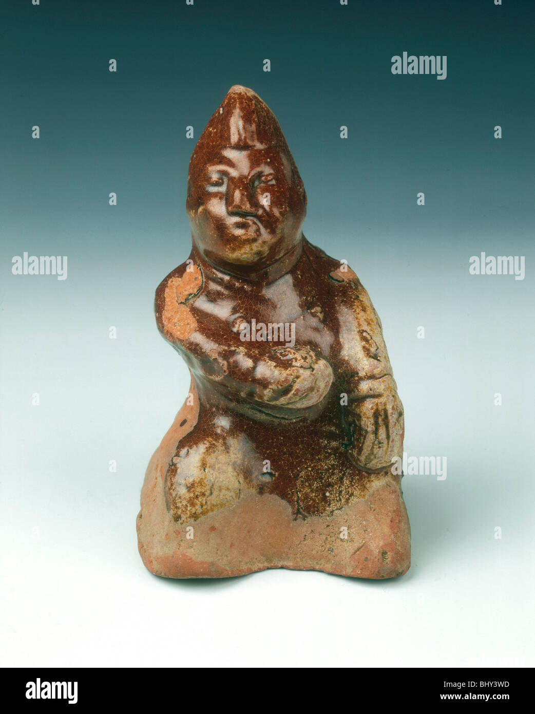 Brown lead glaze pottery dwarf, Eastern Han/Western Jin dynasty, China, 2nd-3rd century. Artist: Unknown Stock Photo