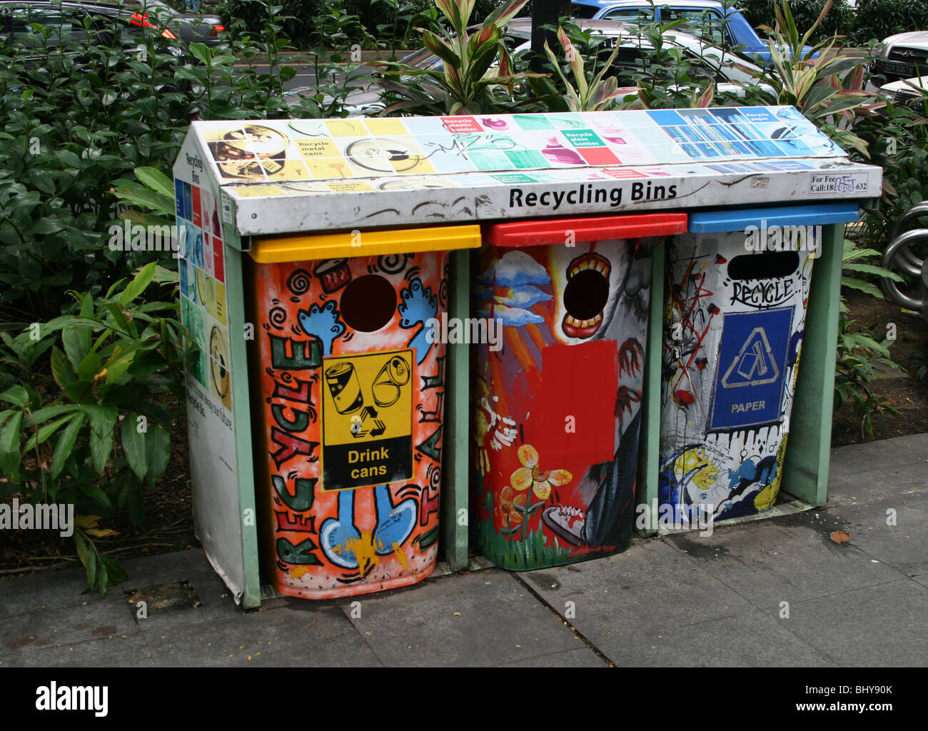 Colourful recycling bins for aluminium glass and paper Singapore Stock