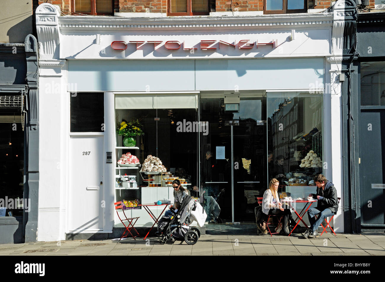 People eating outside Ottolenghi Upper Street Islington London England UK Stock Photo