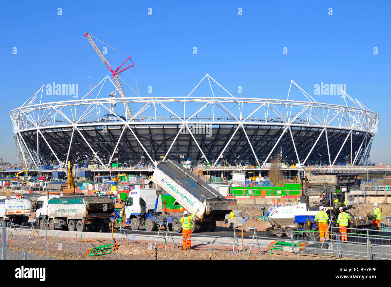 Crane at Stratford 2012 Olympic & Paralympic Games sports stadium building industry construction site work in progress Newham East London England UK Stock Photo