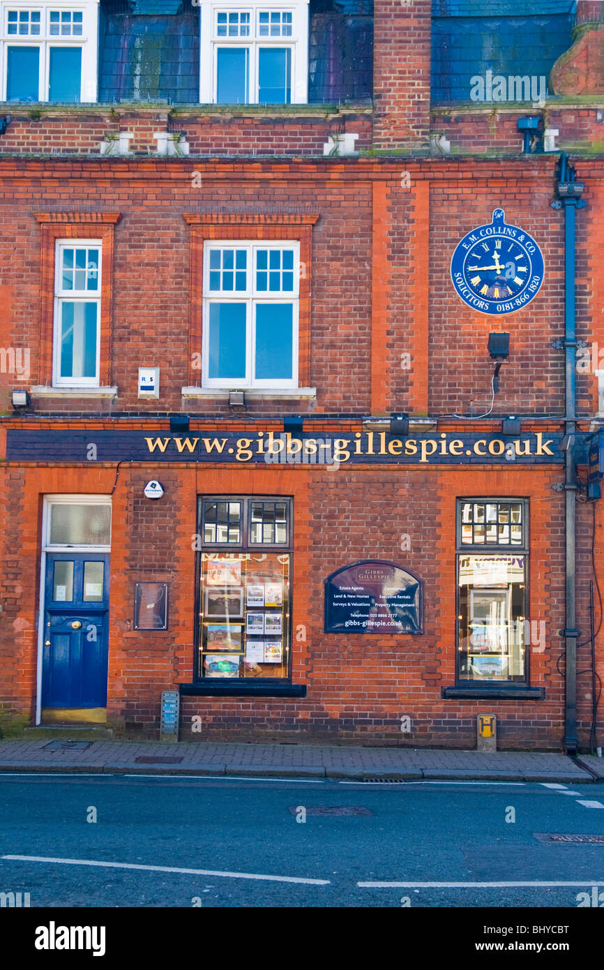 Pinner Middlesex , detail of old office building of E M Collins , solicitors , see clock  Gibbs Gillespie , estate agents Stock Photo