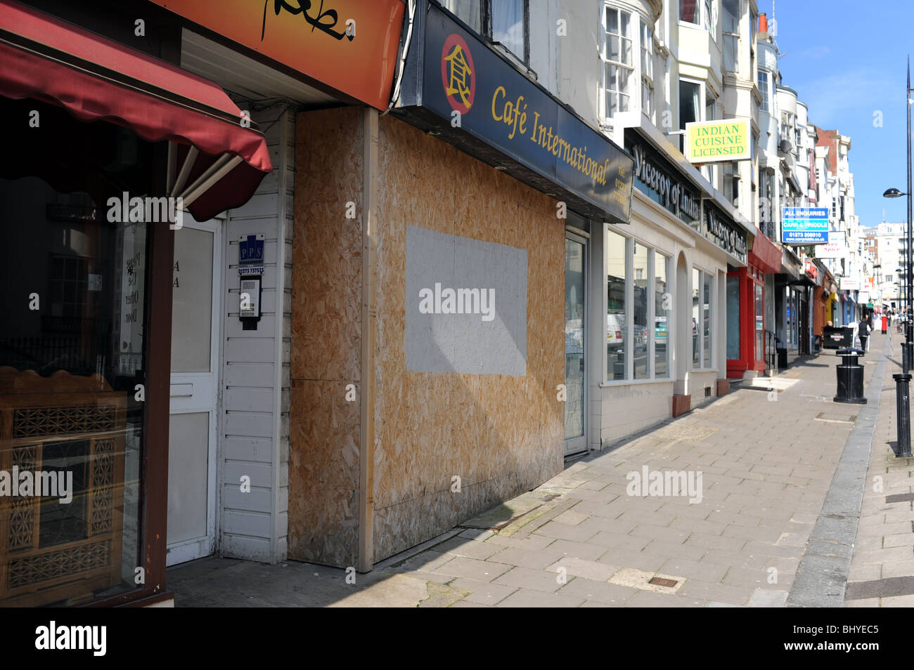Closed down and boarded up restaurants in Preston Street Brighton Sussex UK Stock Photo