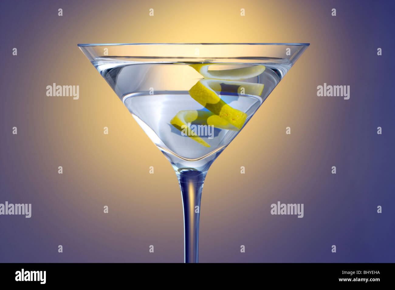 Spotlight on Straight up Martini with Lemon Twist Garnish Stock Photo