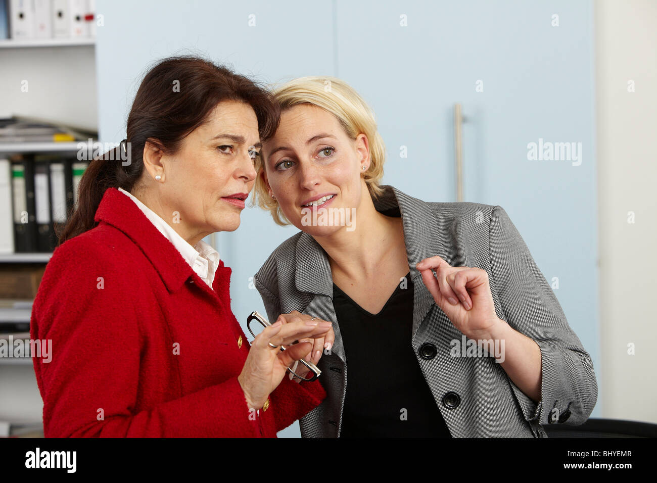 Two elderly women talking gossip hi-res stock photography and images ...