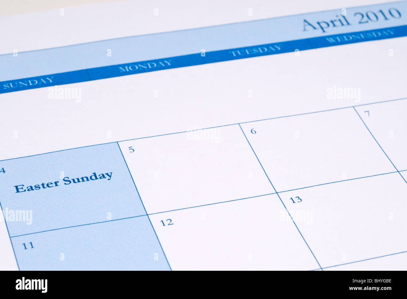 An April 2010 calendar with Easter Sunday highlighted in blue Stock Photo