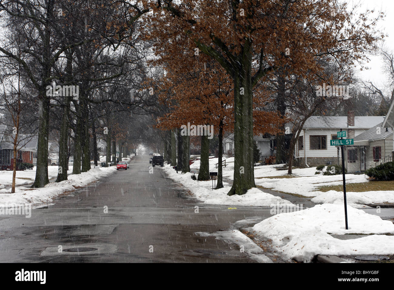 Snow falling on residential street in Lincoln, Nebraska Stock Photo Alamy