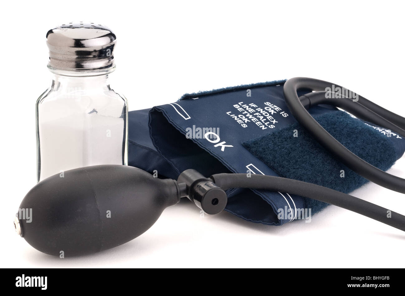 salt shaker and a blood pressure cuff :high blood pressure Stock Photo