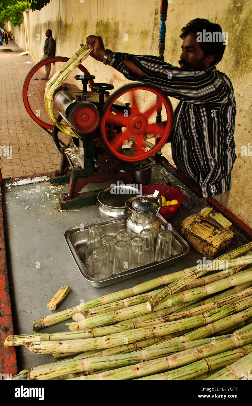 Man making sugar cane juice bangalore hires stock photography and