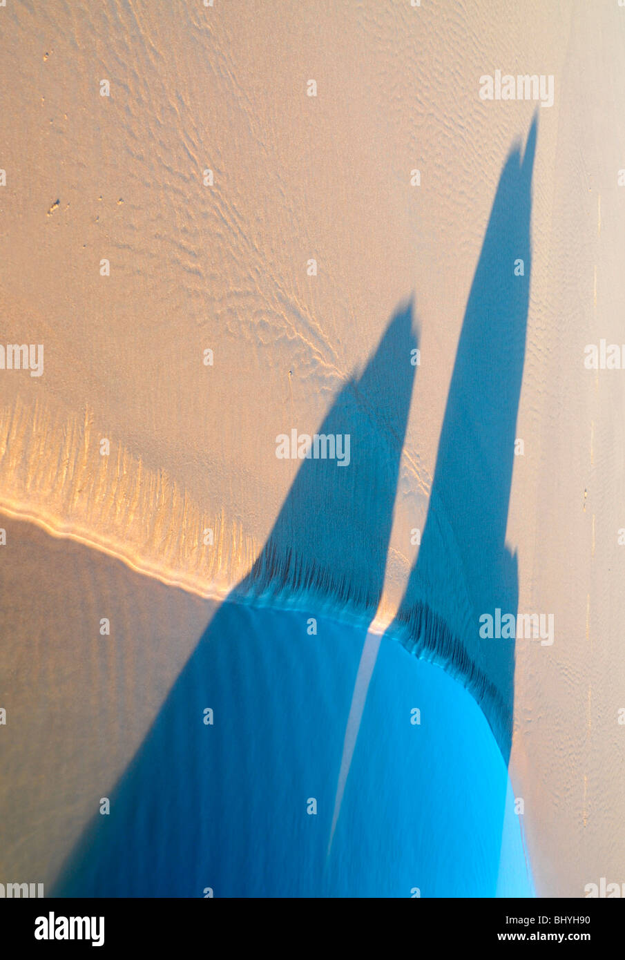 Abstract of coloured shadow on sand. Stock Photo