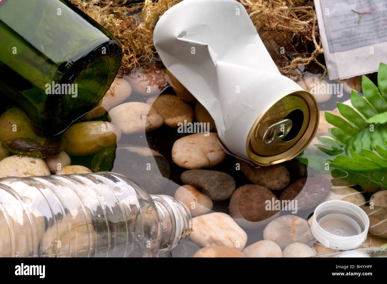 Garbage littering a stream:recycle Stock Photo
