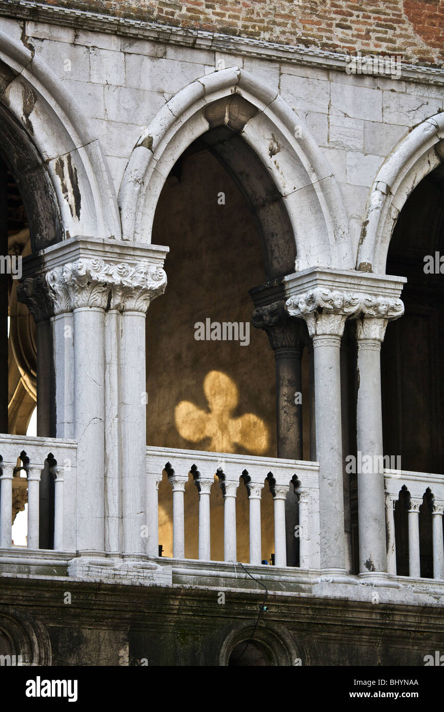 Sunlight streaming through a window causing a shape to appear on a wall in Venice, Veneto, Italy Stock Photo