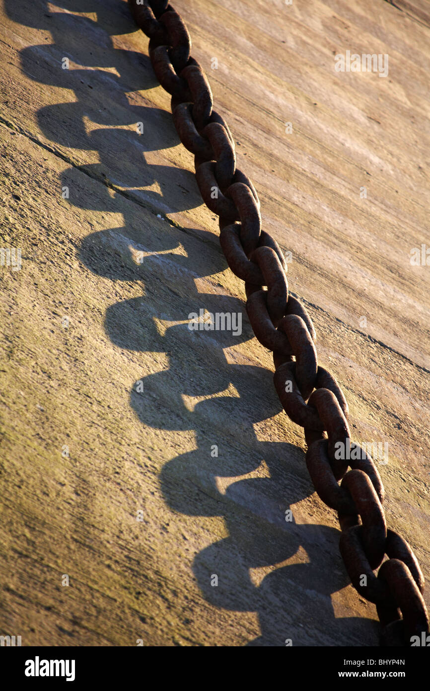Close up of ferry chain with shadows in the evening light Stock Photo